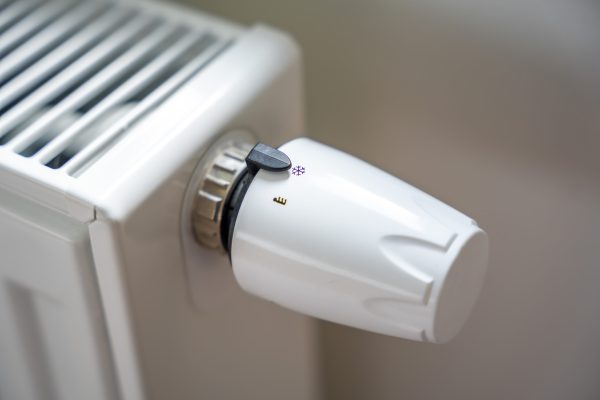 Battery heating knob. Heating in an apartment, at home. Heating prices. High quality photo