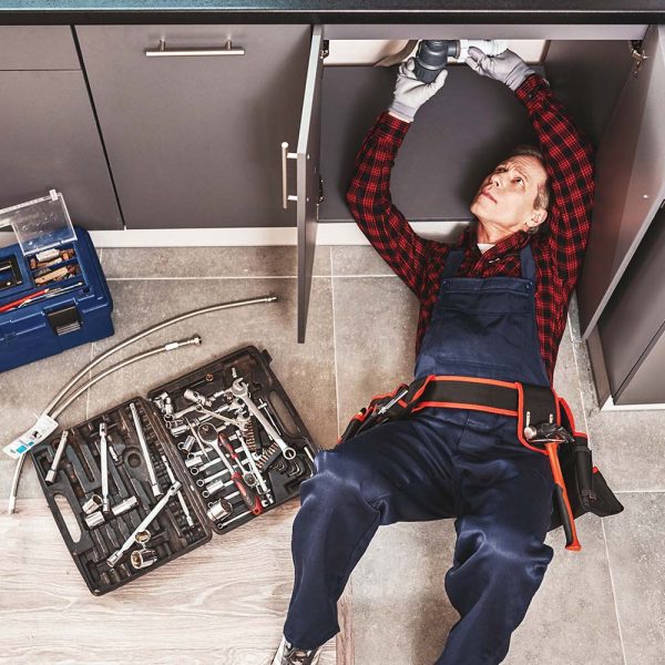tools-case-top-view-of-seniour-handyman-repairing-resize.jpg